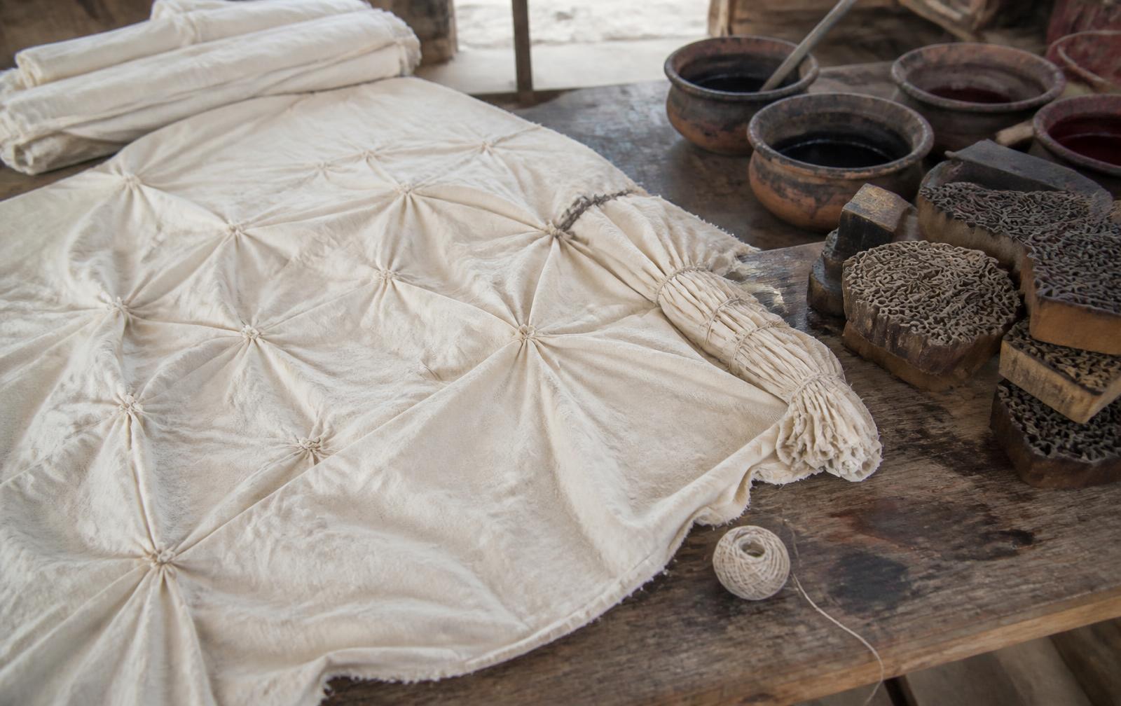 Plain undyed cotton knotted with thread before dyeing